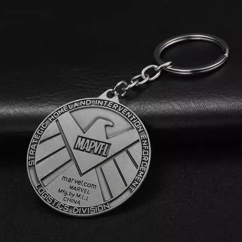 011042 Marvel - Sliver S.H.E.I.L.D Badge Keychain (37 Points)