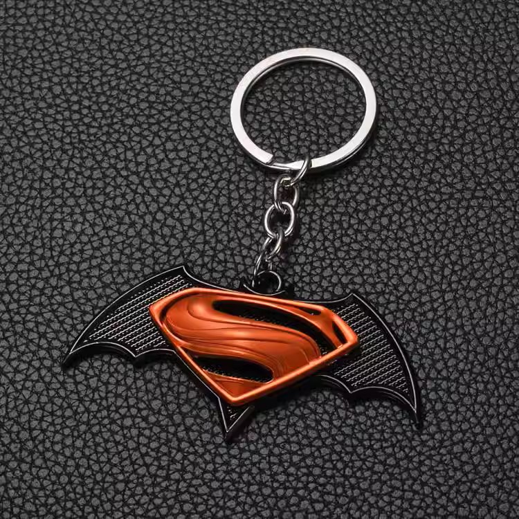 011060 DC - Black and Orange SuperMan Logo Keychain (37 Points)