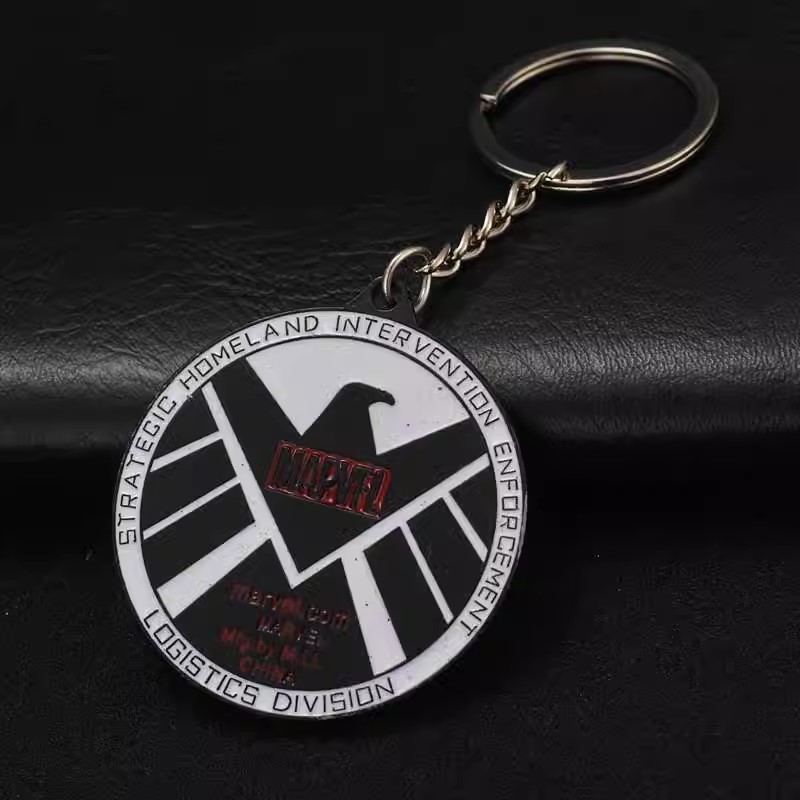 011062 Marvel - Black and White S.H.E.I.L.D Badge Keychain (37 Points)